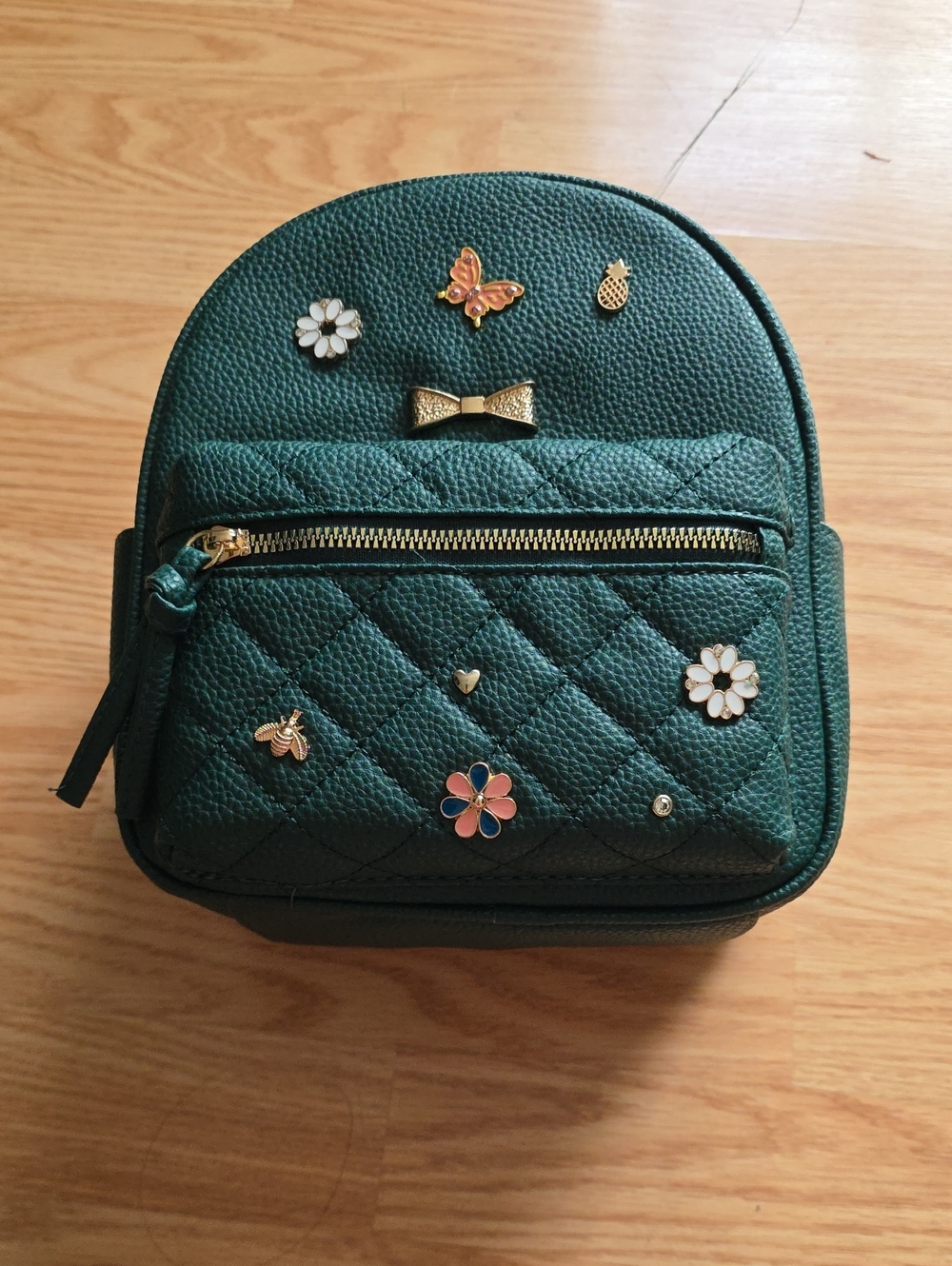 Under One Sky Green Quilted Mini Backpack with Gold Accents & Charms